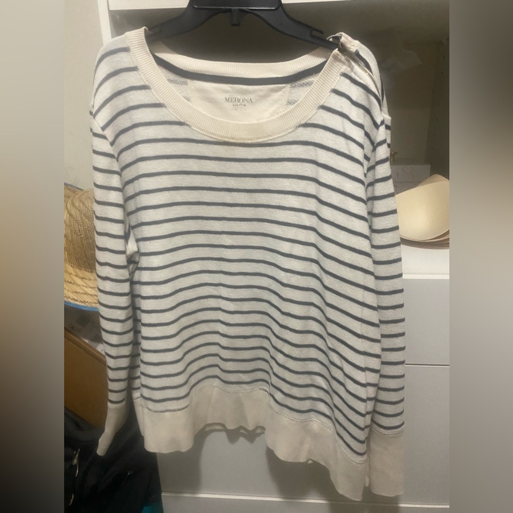 Adorable sailing striped sweatshirt. Zipper detail on shoulder. Banded cuffs